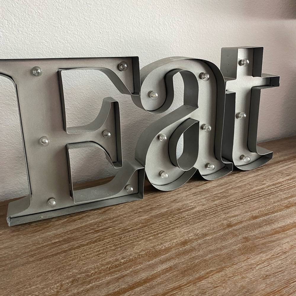 Marquee Eat wall hanging sign